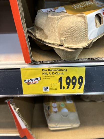 Eine Packung Eier kostet 1,999 €. 